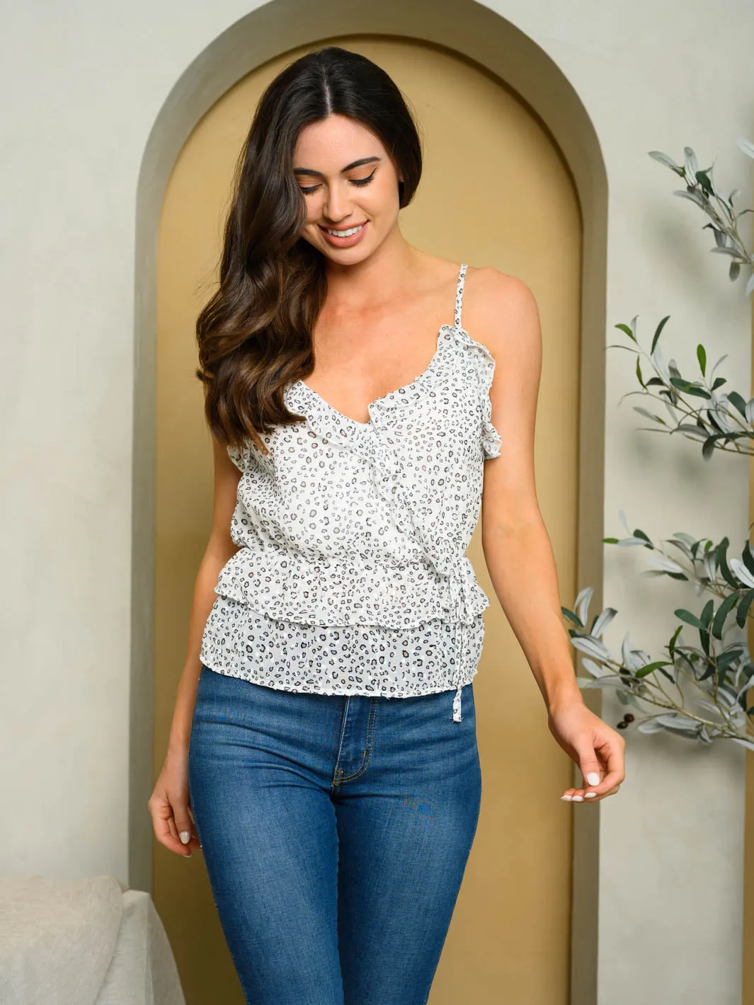WOMEN'S SLEEVELESS ANIMAL PRINT SURPLICE TOP